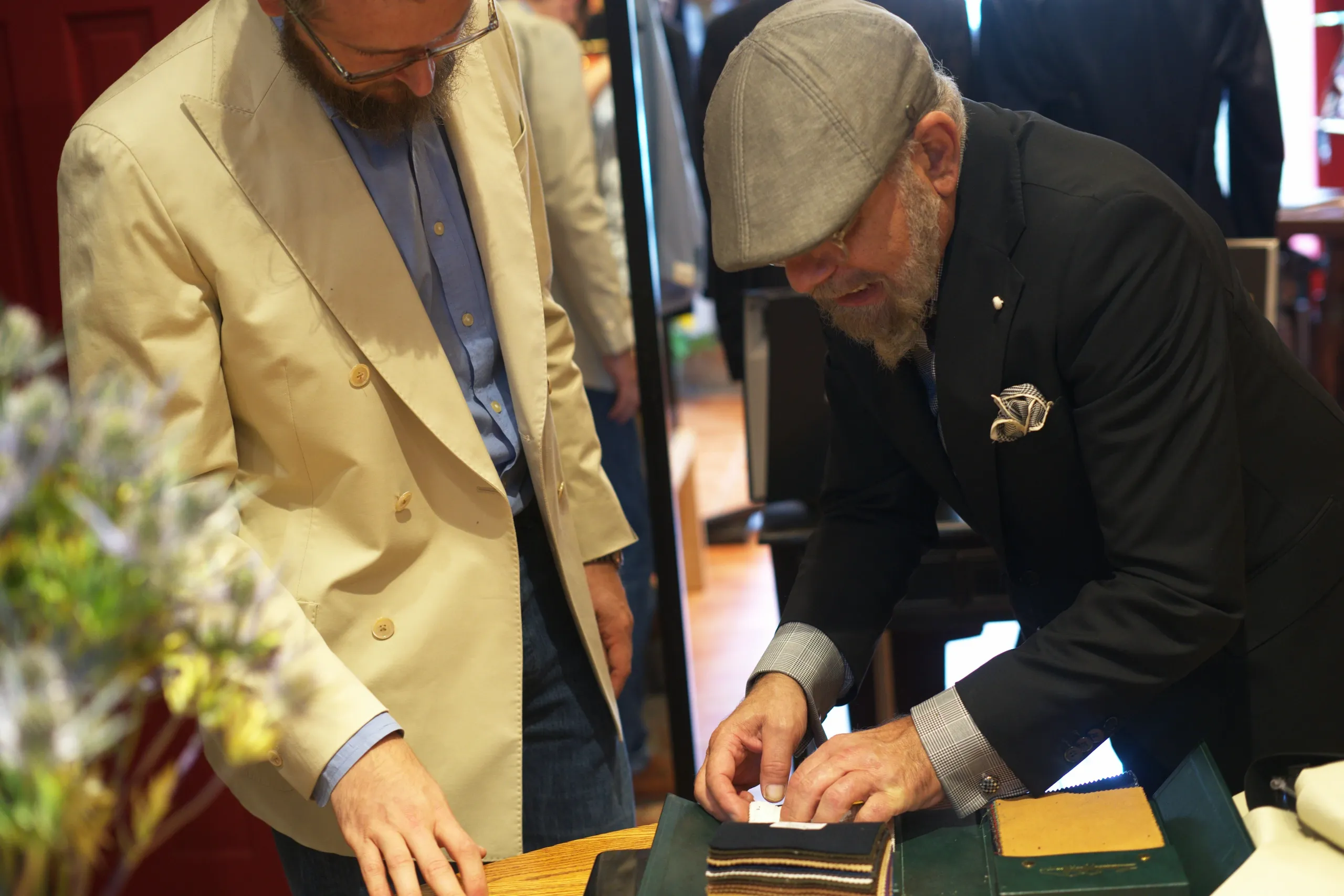 Victor with swatch book during consultation