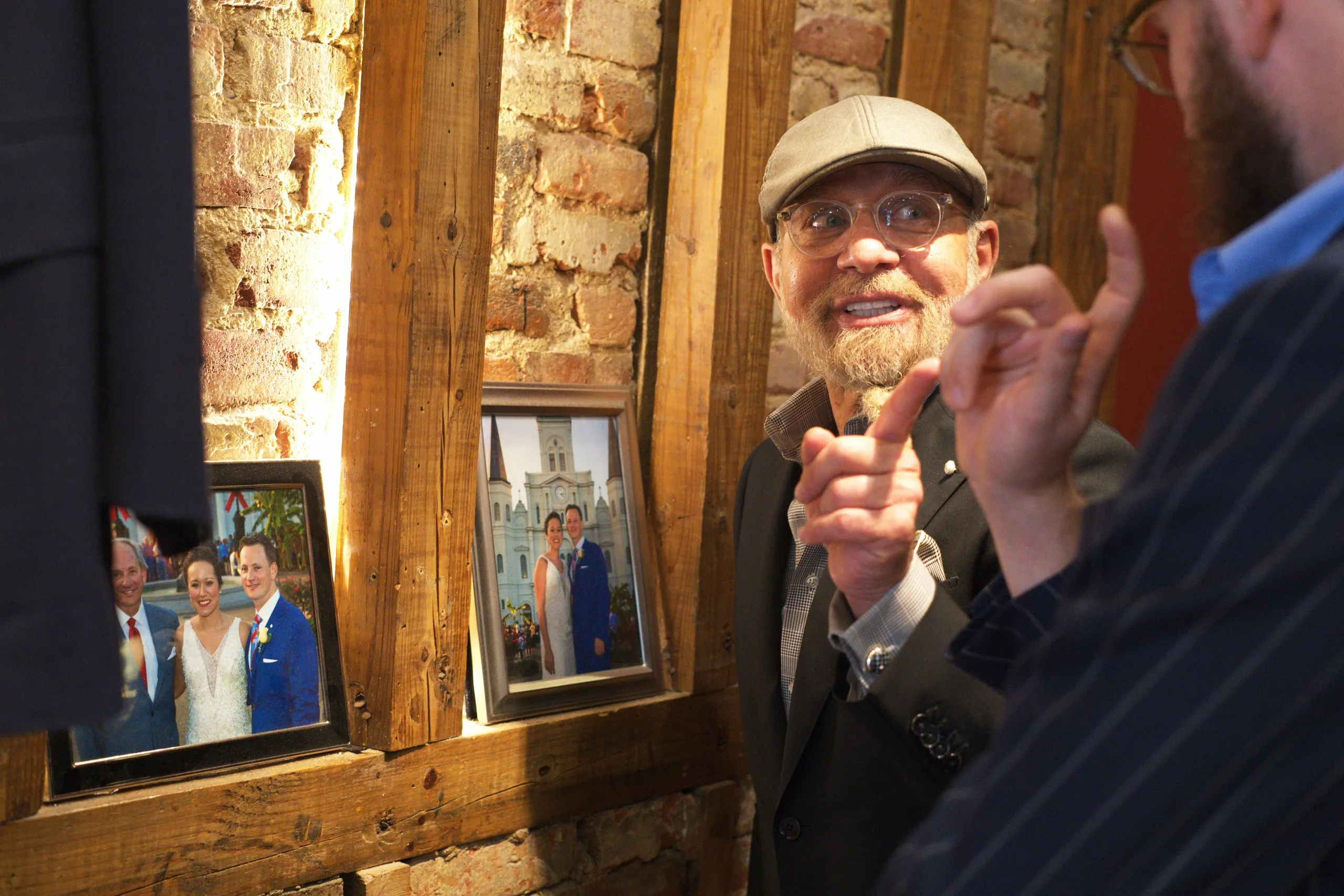 Victor with fabric, speaking about lasting pieces